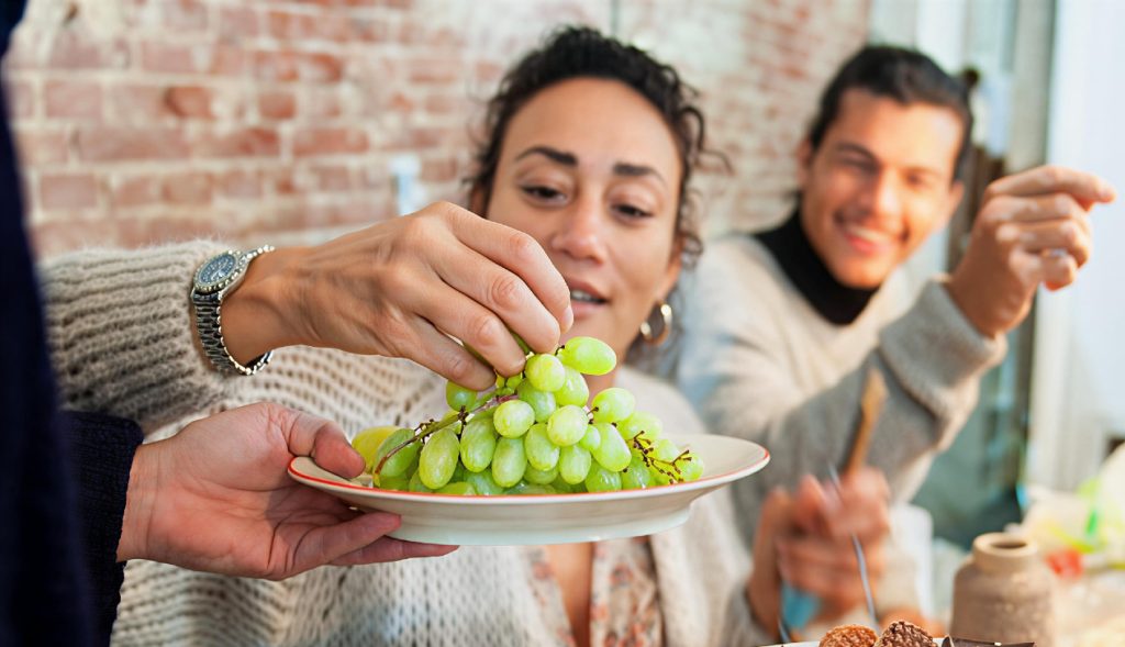 Celebrate saying happy new year in Spanish with the classic Spanish tradition of “las doce uvas de la suerte”